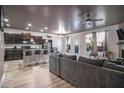 Open concept kitchen and living area with hardwood floors at 529 Dasheill Ln, Atlanta, GA 30349