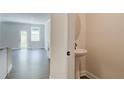 Convenient powder room with pedestal sink at 222 Depot Landing Rd # 58, Auburn, GA 30011