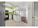Bright kitchen with granite countertops and white cabinets at 795 Hammond Dr # 1407, Atlanta, GA 30328