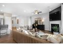 Open living room with a fireplace and comfortable seating at 630 Pineberry Ct, Grayson, GA 30017