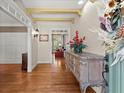 Elegant entryway with hardwood floors and detailed millwork at 6080 Camelia Dr, Douglasville, GA 30135