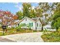 Charming one-story home with a spacious driveway and detached garage at 1576 Temple Ave, Atlanta, GA 30337