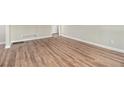 Hardwood floor living room with access to other rooms at 2372 Tyler Way, Decatur, GA 30032