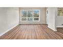 Spacious living room featuring hardwood floors and large windows at 2372 Tyler Way, Decatur, GA 30032