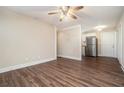 Open living room and kitchen area with hardwood floors at 2040 Forrest Park Se Rd, Atlanta, GA 30315