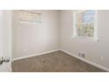 Spacious bedroom with neutral wall colors and carpet at 3395 Springlake Dr, Decatur, GA 30032