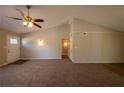 Open living room with hardwood floors and access to other rooms at 100 Glace Rd, Atlanta, GA 30349