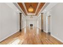 Spacious living room featuring hardwood floors, fireplace, and high ceilings at 3542 Linecrest Rd, Ellenwood, GA 30294