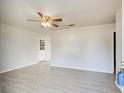Bright living room featuring wood-look floors at 24 Echo Ridge Dr, Powder Springs, GA 30127