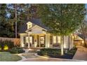 Well-maintained home with a landscaped yard and driveway at 566 Church Ne St, Marietta, GA 30060