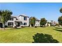 Luxury home community with lush green space and elegant homes at 211 N Esplanade, Alpharetta, GA 30009