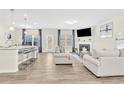 Open-concept living space with modern finishes and plenty of natural light at 9026 Jim Purcell Dr, Covington, GA 30014
