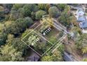 Aerial view highlighting property boundaries and the home's location with proximity to nearby roads at 1141 Goodwin Ne Pl, Brookhaven, GA 30319
