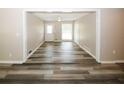 Open living area with wood-look floors at 3130 Mars Hill Rd, Acworth, GA 30101