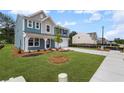 Two-story home with an attached two-car garage and a green lawn, located in a quiet neighborhood at 126 Cherry Glen Way, Euharlee, GA 30145
