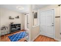 Charming entry with blue rug, bench, and built-in shelving at 4882 Twin Lakes Trl, Atlanta, GA 30360