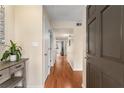 Bright and spacious entryway with hardwood floors and view to living room at 4882 Twin Lakes Trl, Atlanta, GA 30360