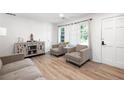Living area featuring hardwood floors and neutral tones at 1847 Elmwood Dr, Austell, GA 30106