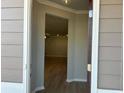 Inviting entryway with an open view to the living room and hardwood floors at 3851 Shelleydale Dr, Powder Springs, GA 30127