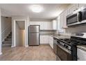 Modern kitchen with stainless steel appliances and granite countertops at 3485 Tarragon Dr, Decatur, GA 30034