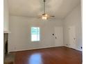 Spacious living room featuring hardwood floors and fireplace at 2921 Oakwilde Ct, Snellville, GA 30039