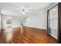 Spacious living room with hardwood floors and neutral walls at 5480 Sable Bay Pt, Atlanta, GA 30349