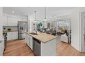 Modern kitchen with granite counters and stainless steel appliances at 200 River Vista Dr # 424, Atlanta, GA 30339