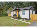 Charming craftsman bungalow with a modern front porch at 2082 Perkerson Sw Rd, Atlanta, GA 30310
