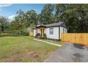 Recently updated home with a wood-toned front porch and new siding at 2082 Perkerson Sw Rd, Atlanta, GA 30310
