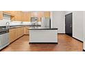 Modern kitchen with island and stainless steel appliances at 5300 Peachtree Rd # 3510, Chamblee, GA 30341
