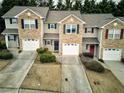 Three-unit townhome building with individual garages at 103 Linton Dr # 1, Acworth, GA 30102