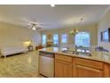 Open kitchen with granite counters, stainless appliances, and breakfast bar at 103 Linton Dr # 1, Acworth, GA 30102