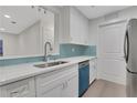Modern kitchen with stainless steel appliances and teal blue accents at 1412 Tuxworth Cir, Decatur, GA 30033