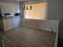 Dining room with wood-look flooring and a chandelier at 2922 Eleanor Ter, Atlanta, GA 30318