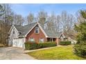 Attractive two-story house with a brick facade and attached garage at 300 Huntington St, Covington, GA 30016