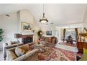 Inviting living room features a brick fireplace and elegant furnishings at 300 Huntington St, Covington, GA 30016