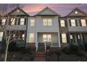 Evening view of a charming 3-story townhome at 3620 Princeton Ave, College Park, GA 30337