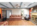 Bright living room featuring hardwood floors and a cozy fireplace at 3177 Richards Dr, Snellville, GA 30039