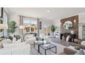 Bright living room featuring hardwood floors and a stylish decor at 121 Silvia Ln # 22, Hapeville, GA 30354