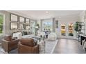 Spacious living room with modern furniture and large windows at 121 Silvia Ln # 22, Hapeville, GA 30354
