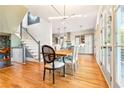 Bright dining room with hardwood floors and access to kitchen at 2188 Niles Pl, Atlanta, GA 30324