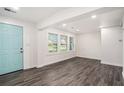 Spacious living room with light flooring and large windows at 1846 Oakmont Nw Dr, Atlanta, GA 30314