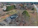 Wide aerial view showcasing the property's spacious lot and peaceful surroundings at 1349 Highway 81 E, Mcdonough, GA 30252