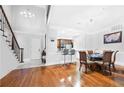 Bright dining room with hardwood floors and kitchen views at 3280 Stillhouse Se Ln # 410, Atlanta, GA 30339