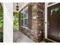 Charming front porch with stone facade and dark brown door at 2741 Prado Ln, Marietta, GA 30066