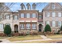 Attractive brick townhome boasting a welcoming front porch at 2344 Saint Davids Nw Sq # 2, Kennesaw, GA 30152