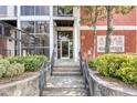 Building entrance with steps and landscaping at 505 Whitehall Sw St # 101, Atlanta, GA 30303