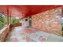 Covered brick patio with access to the home at 2425 Hillside Ave, Decatur, GA 30032