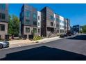 Modern townhome community with brick and metal accents at 377 Grant Se Cir # 1724, Atlanta, GA 30315