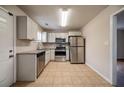 Renovated kitchen, featuring stainless steel appliances and granite countertops at 3738 Larkspur Ter, Decatur, GA 30032